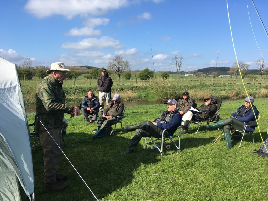 Course members receiving instruction